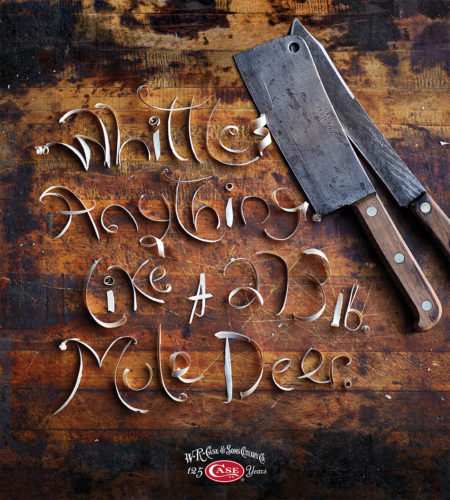 Scraps from a whittled piece of wood spell out a message next to a large knife