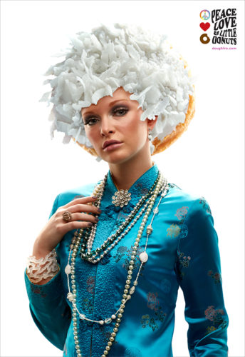 Advertising Photographers, beautiful woman wearing vintage clothing with a donut on her head