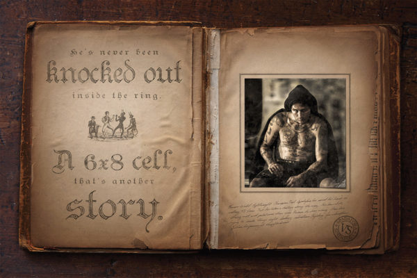 A heavily-tattooed fighter looks at the camera from the page of a weathered book